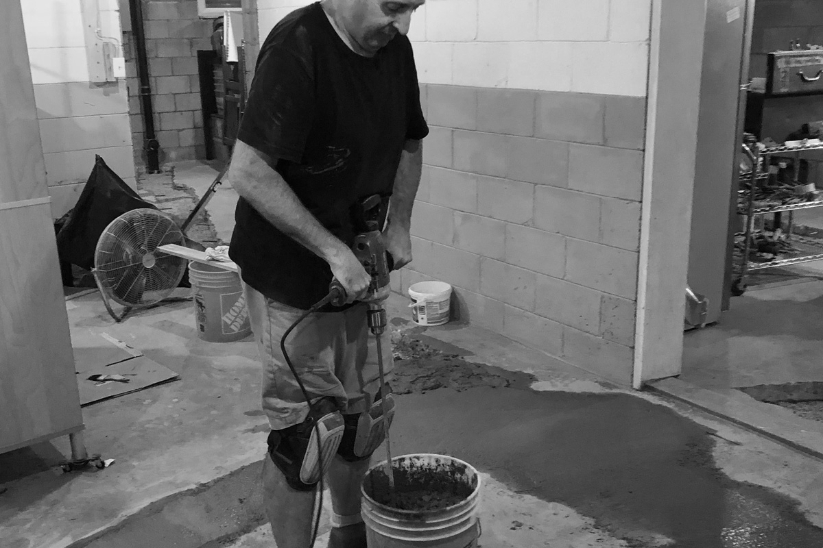 Replacing cast iron sewer lines under the basement slab