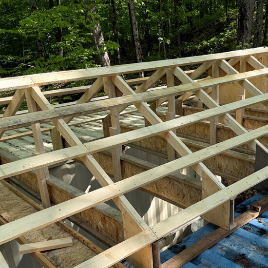 Strapped trusses ready for steel roofing