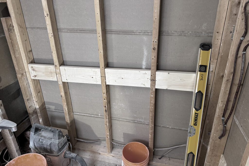Blocking installed for grab bars